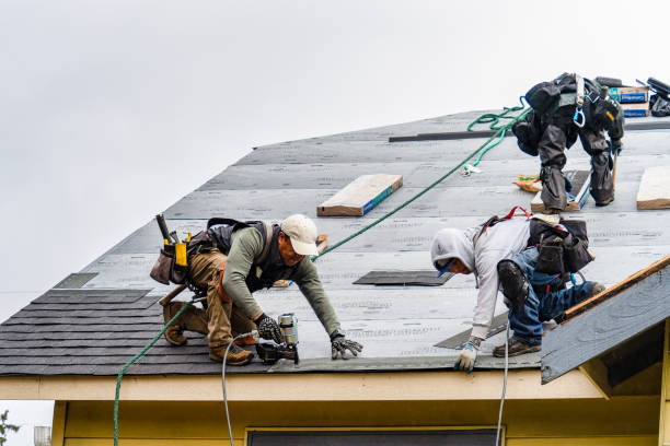 Professional Gutter Installation technician working in Montague, CA